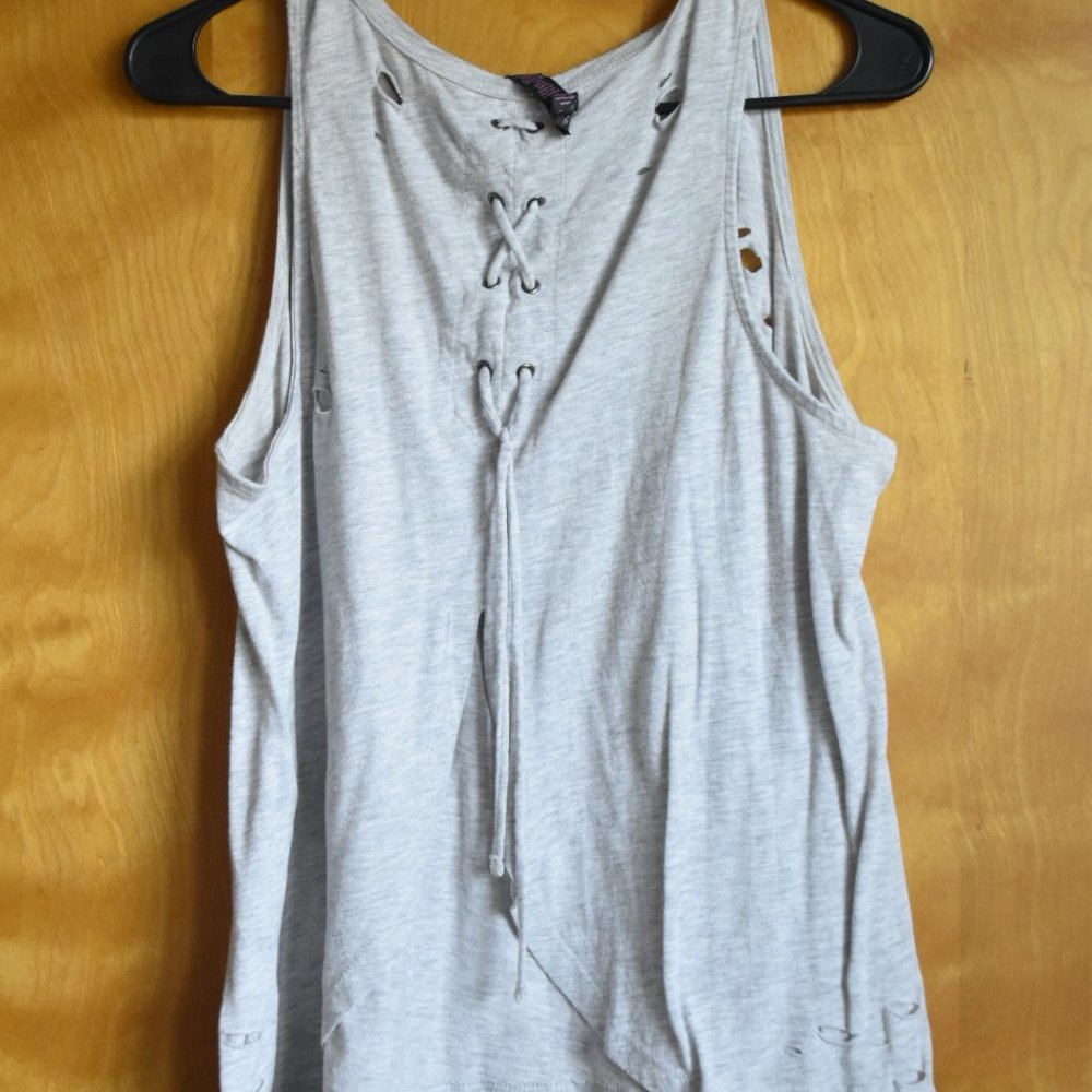 Gray tank-top with slits around outside of the whole shirt.